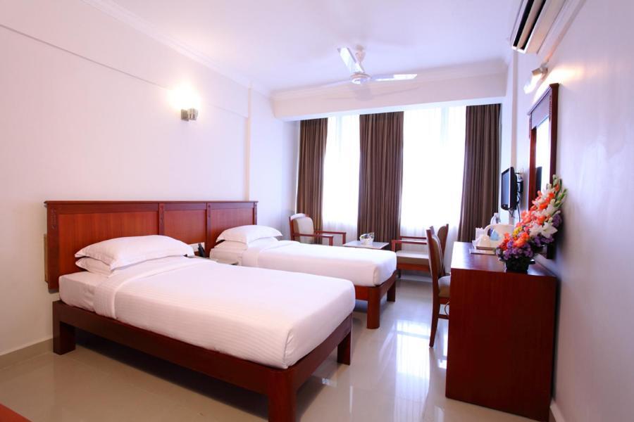 Pooram International Hotel Thrissur Szoba fotó